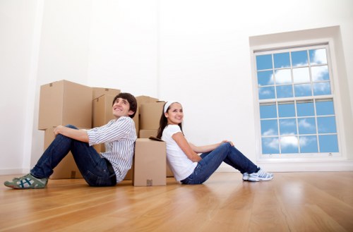 Organized storage unit in Southgate with labeled furniture items